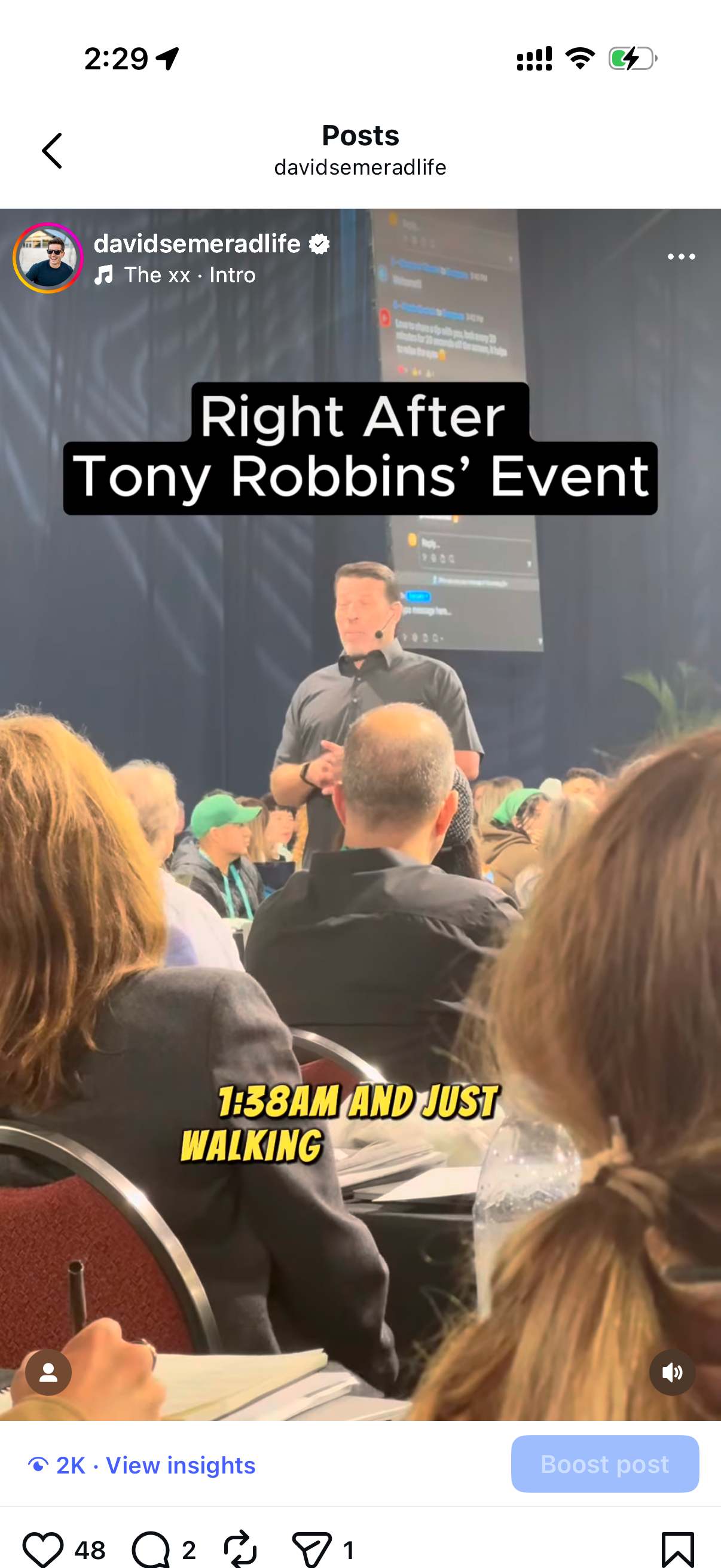 Tony Robbins on stage at his event